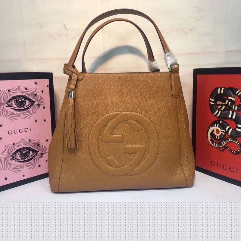 G*u*i top handle bags